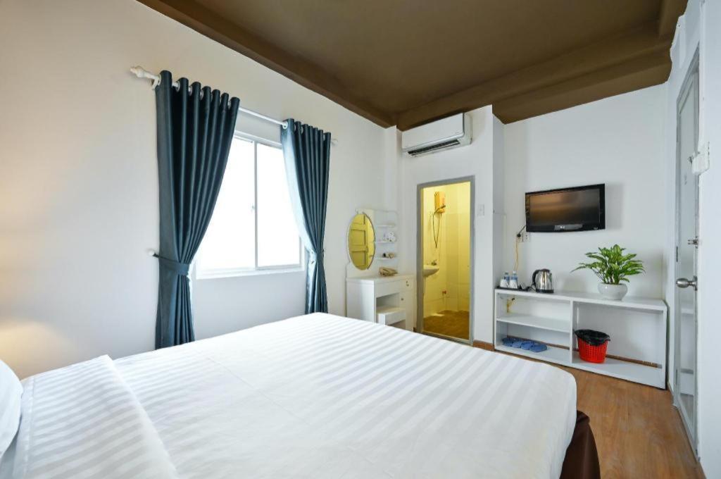 The Noble Swan Wood Park Hotel Ho Chi Minh-stad Buitenkant foto